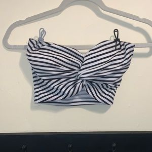 Black and white striped crop top with twist front